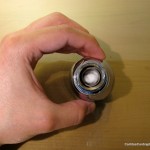 Add the cotton balls to the top pipe fitting.